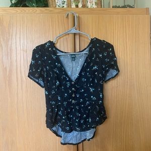 Floral peplum top with cute button detail